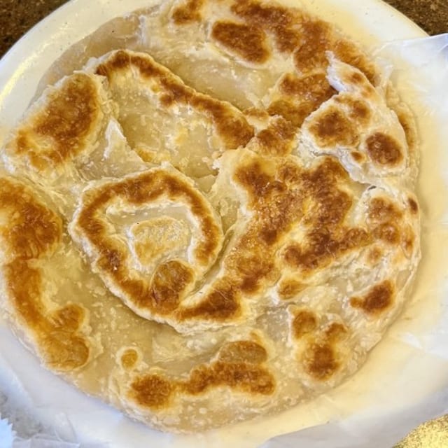 Paratha with Salna (Korma).